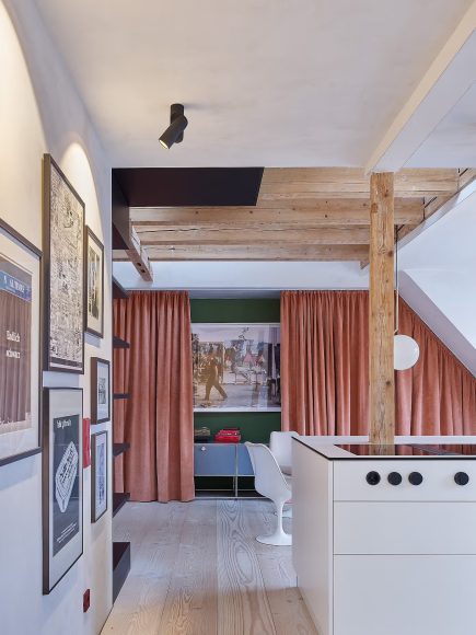 004-apartment-o-a-walkable-bookshelf-recasts-living-across-two-levels-1390x1853